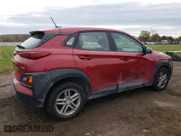 2019 Hyundai Kona SE z VIN KM8K1CAA2KU280445, wystawiony jako Copart lot #82716015 z przebiegiem 86 415 mil mil oraz Czysty tytuł • Clean title. Historia ofert i sprzedaży dostępna na DreamBid. Obrazek 3.