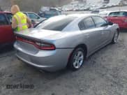 ✅ 2015 Dodge Charger SE • VIN: 2C3CDXBG4FH747971 • Lot: 43658374. Listed on IAAI with 220,885 mi. Free auction sales archive from the USA and detailed vehicle history report at DreamBid. Image 4.