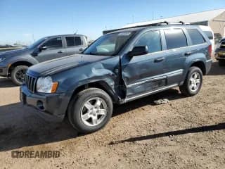 ✅ 2007 Jeep Grand Cherokee Laredo • VIN: 1J8HR48P27C591001 • Лот: 84406065. Опубликован ранее на Copart с пробегом 118 723 миль. Бесплатный доступ к архиву аукционных продаж из США и подробный отчёт об истории автомобиля на DreamBid. Изображение 1.