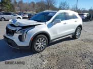 ✅ 2022 Cadillac XT4 AWD Premium Luxury • VIN: 1GYFZDR41NF105299 • Лот: 41257154. Опубликован ранее на IAAI с пробегом 34 904 миль. Бесплатный доступ к архиву аукционных продаж из США и подробный отчёт об истории автомобиля на DreamBid. Изображение 2.