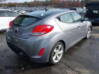 ✅ 2014 Hyundai Veloster • VIN: KMHTC6AD9EU192555 • Лот: 43606825. Опубликован ранее на IAAI с пробегом 69 171 миль. Бесплатный доступ к архиву аукционных продаж из США и подробный отчёт об истории автомобиля на DreamBid. Изображение 4.