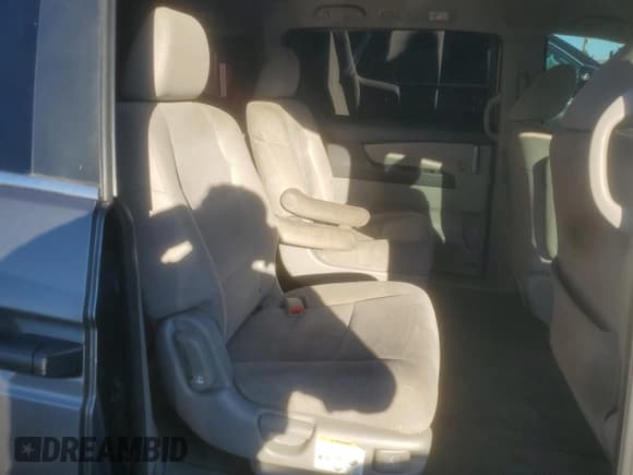 ✅ 2013 Honda Odyssey LX • VIN: 5FNRL5H20DB039065 • Лот: 85134445. Опубликован ранее на Copart с пробегом 165 751 миль. Бесплатный доступ к архиву аукционных продаж из США и подробный отчёт об истории автомобиля на DreamBid. Изображение 11.