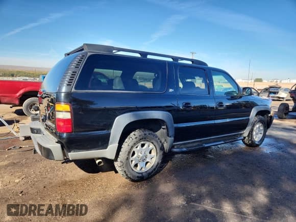 ✅ 2004 Chevrolet Suburban LT • VIN: 3GNFK16Z34G266492 • Lot: 90103875. Listed on Copart with 215,482 mi. Free auction sales archive from the USA and detailed vehicle history report at DreamBid. Image 3.