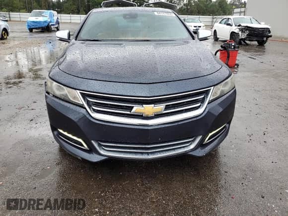 2014 Chevrolet Impala LTZ with VIN 2G1155S39E9191837, listed as a Copart auction lot 84747855 with 180,017 mi miles and Salvage title. Bid and sale history available at DreamBid. Image 5.
