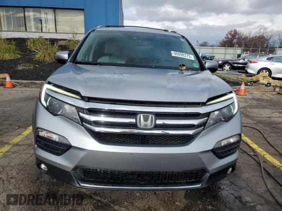 ✅ 2016 Honda Pilot Elite • VIN: 5FNYF6H01GB059823 • Lot: 90898275. Wystawiony na Copart z przebiegiem 161 786 mil. Bezpłatny archiwum sprzedaży aukcyjnych z USA i szczegółowy raport historii pojazdu na DreamBid. Zdjęcie 5.