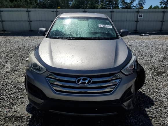 2015 Hyundai Santa Fe with VIN 5XYZT3LB4FG296155, listed as a Copart auction lot 57675435 with 70,209 mi miles and Salvage title. Bid and sale history available at DreamBid. Image 5.