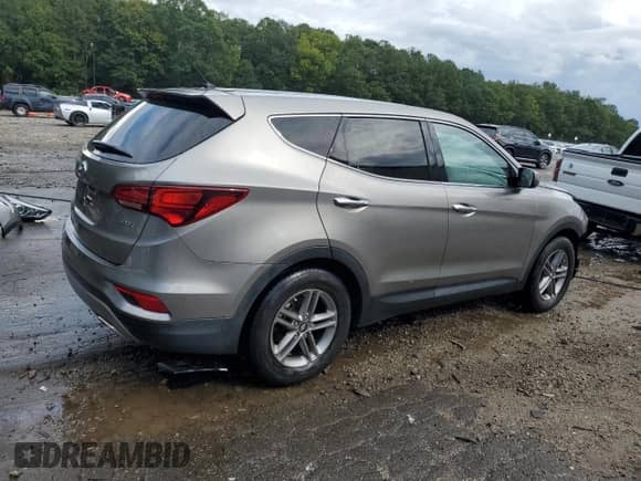 2018 Hyundai Santa Fe 2.4L with VIN 5XYZT3LB2JG559137, listed as a Copart auction lot 83994075 with 121,622 mi miles and Salvage title. Bid and sale history available at DreamBid. Image 3.