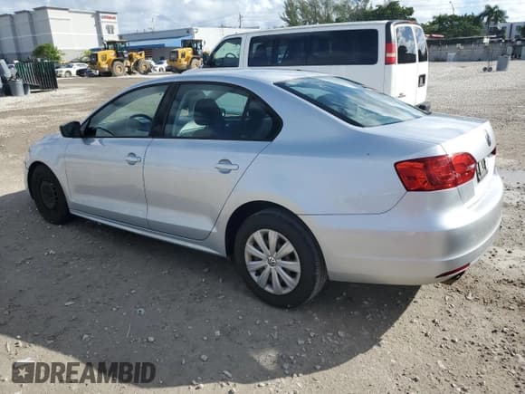 ✅ 2014 Volkswagen Jetta S • VIN: 3VW2K7AJ3EM333779 • Lot: 90272395. Listed on Copart with 139,100 mi. Free auction sales archive from the USA and detailed vehicle history report at DreamBid. Image 2.