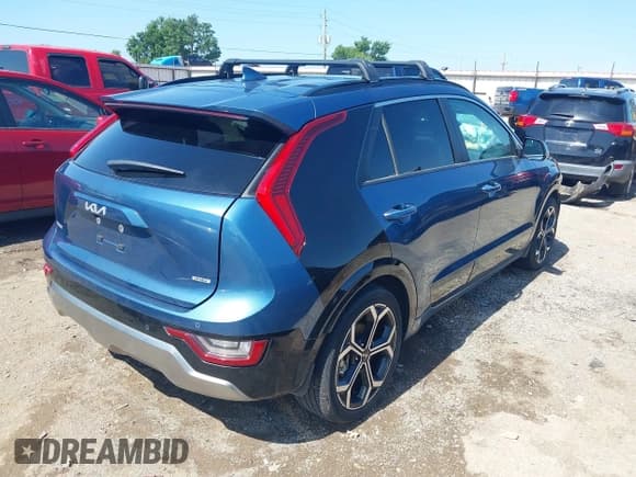 ✅ 2023 Kia Niro SX Touring • VIN: KNDCR3LF6P5055831 • Lot: 42544117. Wystawiony na IAAI z przebiegiem 57 889 mil. Bezpłatny archiwum sprzedaży aukcyjnych z USA i szczegółowy raport historii pojazdu na DreamBid. Zdjęcie 4.
