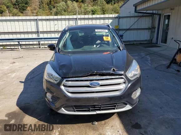 2017 Ford Escape Titanium с VIN 1FMCU9J99HUB85393, выставлен на аукционе Copart как лот 81259365 с пробегом 89 136 миль миль и Списание • Salvage title. История ставок и продаж доступна на DreamBid. Изображение 5.