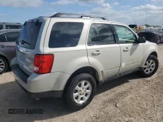 ✅ 2009 Mazda Tribute Sport • VIN: 4F2CZ027X9KM01666 • Лот: 80902224. Опубликован ранее на Copart с пробегом Не указан. Бесплатный доступ к архиву аукционных продаж из США и подробный отчёт об истории автомобиля на DreamBid. Изображение 3.