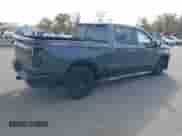 2021 Chevrolet Silverado 1500 RST with VIN 1GCUYEET9MZ264460, listed as a IAAI auction lot 43612602 with 31,804 mi miles and . Bid and sale history available at DreamBid. Image 4.