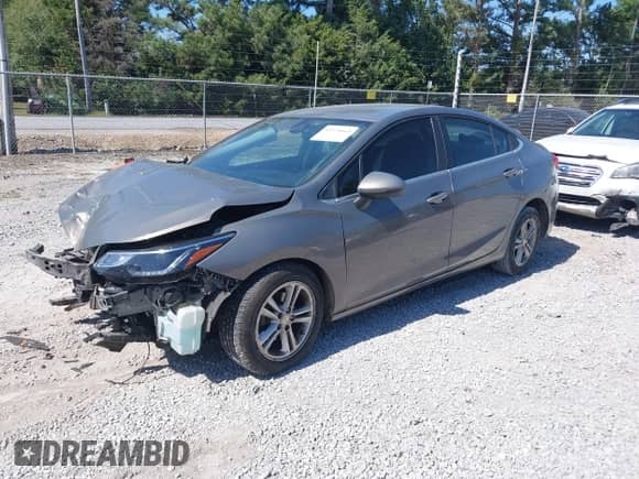 2018 Chevrolet Cruze LT z VIN 1G1BE5SM4J7168300, wystawiony jako IAAI lot #43374665 z przebiegiem 148 848 mil mil oraz . Historia ofert i sprzedaży dostępna na DreamBid. Obrazek 18.