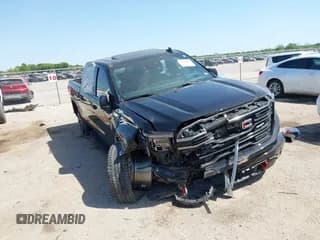 ✅ 2023 GMC Sierra 1500 AT4 • VIN: 3GTUUEE82PG115769 • Лот: 42011061. Опубликован ранее на IAAI с пробегом 43 909 миль. Бесплатный доступ к архиву аукционных продаж из США и подробный отчёт об истории автомобиля на DreamBid. Изображение 1.
