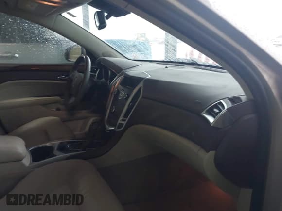 ✅ 2012 Cadillac SRX Luxury Collection • VIN: 3GYFNAE33CS512444 • Lot: 43743902. Wystawiony na IAAI z przebiegiem 94 299 mil. Bezpłatny archiwum sprzedaży aukcyjnych z USA i szczegółowy raport historii pojazdu na DreamBid. Zdjęcie 5.