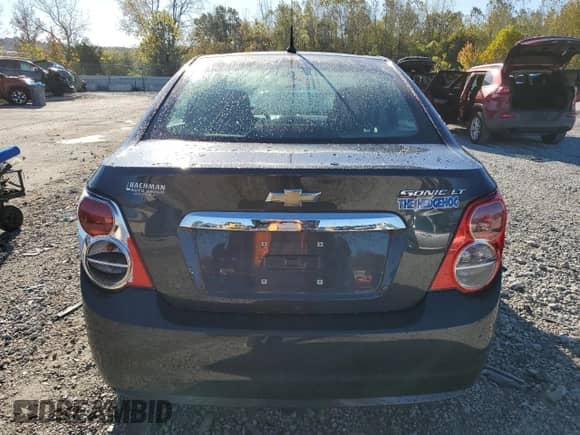 ✅ 2014 Chevrolet Sonic LT • VIN: 1G1JC5SH3E4223783 • Lot: 87204705. Listed on Copart with 69,602 mi. Free auction sales archive from the USA and detailed vehicle history report at DreamBid. Image 6.