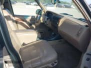 ✅ 1999 Ford Explorer XLT • VIN: 1FMZU34E9XUA41423 • Lot: 42845841. Wystawiony na IAAI z przebiegiem 196 536 mil. Bezpłatny archiwum sprzedaży aukcyjnych z USA i szczegółowy raport historii pojazdu na DreamBid. Zdjęcie 5.