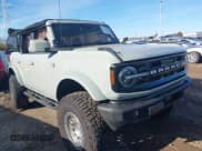 ✅ 2021 Ford Bronco Outer Banks • VIN: 1FMDE5DH0MLA61168 • Lot: 43643715. Listed on IAAI with 54,164 mi. Free auction sales archive from the USA and detailed vehicle history report at DreamBid. Image 1.