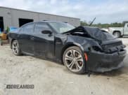 ✅ 2021 Dodge Charger R/T • VIN: 2C3CDXCT0MH524688 • Lot: 81969905. Listed on Copart with 94,670 mi. Free auction sales archive from the USA and detailed vehicle history report at DreamBid. Image 4.