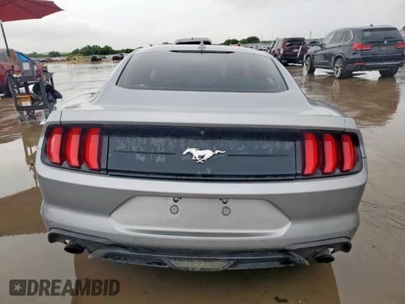 2021 Ford Mustang EcoBoost with VIN 1FA6P8TH7M5137392, listed as a Copart auction lot 64767285 with 100,212 mi miles and Salvage title. Bid and sale history available at DreamBid. Image 6.