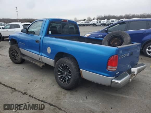 2000 Dodge Dakota Sport z VIN 1B7GG26N0YS530588, wystawiony jako Copart lot #44699515 z przebiegiem Nie podano mil oraz Szkoda całkowita • Salvage title. Historia ofert i sprzedaży dostępna na DreamBid. Obrazek 2.