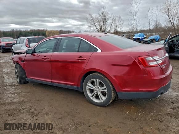 ✅ 2016 Ford Taurus SEL • VIN: 1FAHP2E88GG124498 • Лот: 94717085. Опубликован ранее на Copart с пробегом 128 610 миль. Бесплатный доступ к архиву аукционных продаж из США и подробный отчёт об истории автомобиля на DreamBid. Изображение 2.