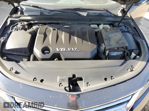 2016 Chevrolet Impala LT z VIN 2G1115S30G9120413, wystawiony jako Copart lot #51677205 z przebiegiem 156 624 mil mil oraz Szkoda całkowita • Salvage title. Historia ofert i sprzedaży dostępna na DreamBid. Obrazek 12.