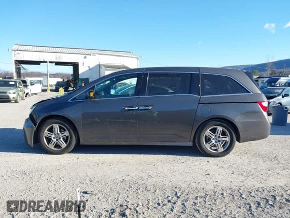✅ 2012 Honda Odyssey Touring • VIN: 5FNRL5H93CB037791 • Лот: 43678831. Опубликован ранее на IAAI с пробегом 241 470 миль. Бесплатный доступ к архиву аукционных продаж из США и подробный отчёт об истории автомобиля на DreamBid. Изображение 15.