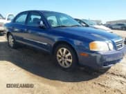 ✅ 2004 Kia Optima LX • VIN: KNAGD128645306685 • Лот: 41488256. Опубликован ранее на IAAI с пробегом 216 974 миль. Бесплатный доступ к архиву аукционных продаж из США и подробный отчёт об истории автомобиля на DreamBid. Изображение 1.