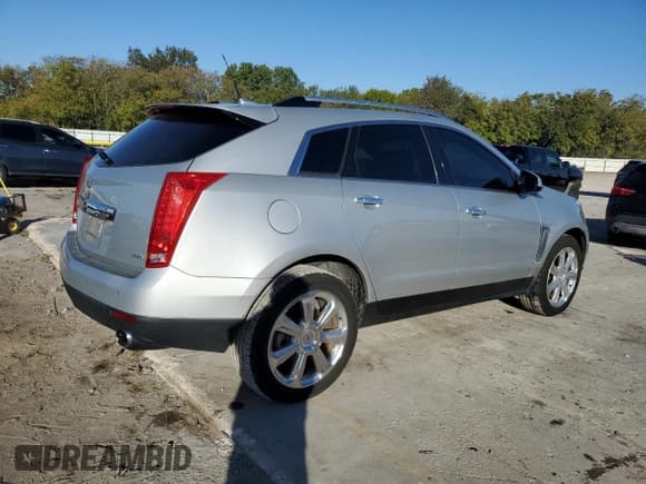 ✅ 2013 Cadillac SRX Performance Collection • VIN: 3GYFNDE33DS603023 • Lot: 90903945. Listed on Copart with 86,458 mi. Free auction sales archive from the USA and detailed vehicle history report at DreamBid. Image 3.