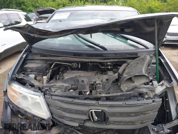 ✅ 2013 Honda Odyssey Touring • VIN: 5FNRL5H92DB027285 • Lot: 42803299. Listed on IAAI with 245,674 mi. Free auction sales archive from the USA and detailed vehicle history report at DreamBid. Image 10.