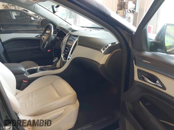 ✅ 2015 Cadillac SRX • VIN: 3GYFNAE38FS554936 • Lot: 42692957. Wystawiony na IAAI z przebiegiem 138 978 mil. Bezpłatny archiwum sprzedaży aukcyjnych z USA i szczegółowy raport historii pojazdu na DreamBid. Zdjęcie 5.