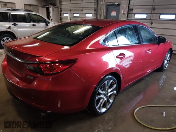 ✅ 2014 Mazda 6 i Grand Touring • VIN: JM1GJ1W55E1101492 • Lot: 43716290. Listed on IAAI with 151,453 mi. Free auction sales archive from the USA and detailed vehicle history report at DreamBid. Image 4.
