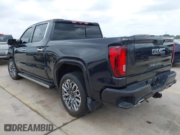 ✅ 2023 GMC Sierra 1500 Denali Ultimate • VIN: 1GTUUHEL6PZ295182 • Лот: 42497298. Опубликован ранее на IAAI с пробегом 18 401 миль. Бесплатный доступ к архиву аукционных продаж из США и подробный отчёт об истории автомобиля на DreamBid. Изображение 3.