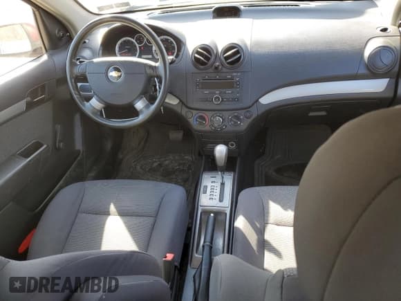 ✅ 2007 Chevrolet Aveo LS • VIN: KL1TD56687B097027 • Lot: 49032705. Wystawiony na Copart z przebiegiem 55 916 mil. Bezpłatny archiwum sprzedaży aukcyjnych z USA i szczegółowy raport historii pojazdu na DreamBid. Zdjęcie 8.