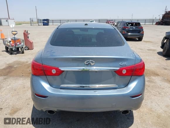✅ 2015 Infiniti Q50 • VIN: JN1BV7AP2FM357716 • Lot: 42504273. Listed on IAAI with 74,608 mi. Free auction sales archive from the USA and detailed vehicle history report at DreamBid. Image 17.