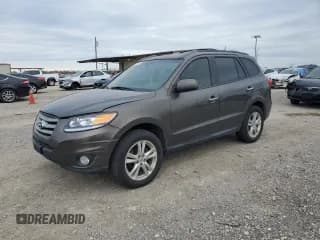✅ 2012 Hyundai Santa Fe Limited • VIN: 5XYZK4AG1CG156812 • Lot: 87953285. Listed on Copart with 186,428 mi. Free auction sales archive from the USA and detailed vehicle history report at DreamBid. Image 1.