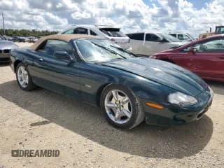 ✅ 1997 Jaguar XK • VIN: SAJGX274XVC013134 • Лот: 73891734. Опубликован ранее на Copart с пробегом Не указан. Бесплатный доступ к архиву аукционных продаж из США и подробный отчёт об истории автомобиля на DreamBid. Изображение 4.