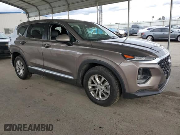 2019 Hyundai Santa Fe SE z VIN 5NMS2CAD6KH094524, wystawiony jako Copart lot #36191653 z przebiegiem 63 098 mil mil oraz . Historia ofert i sprzedaży dostępna na DreamBid. Obrazek 4.