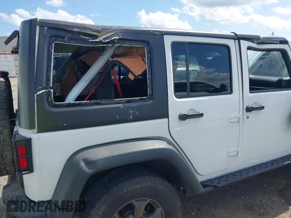 ✅ 2017 Jeep Wrangler Unlimited Rubicon Recon • VIN: 1C4BJWFG1HL693572 • Lot: 42601855. Listed on IAAI with 64,342 mi. Free auction sales archive from the USA and detailed vehicle history report at DreamBid. Image 6.