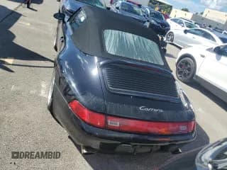 ✅ 1995 Porsche 911 • VIN: WP0CA2998SS341094 • Lot: 74342534. Wystawiony na Copart z przebiegiem 49 930 mil. Bezpłatny archiwum sprzedaży aukcyjnych z USA i szczegółowy raport historii pojazdu na DreamBid. Zdjęcie 6.