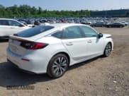 ✅ 2023 Honda Civic EX-L • VIN: 19XFL1H76PE006668 • Lot: 42953349. Wystawiony na IAAI z przebiegiem 7 892 mil. Bezpłatny archiwum sprzedaży aukcyjnych z USA i szczegółowy raport historii pojazdu na DreamBid. Zdjęcie 4.