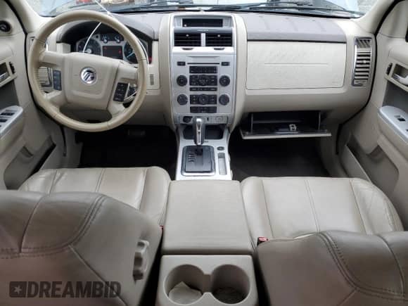 2011 Mercury Mariner z VIN 4M2CN8B76BKJ06364, wystawiony jako Copart lot #50040745 z przebiegiem 153 675 mil mil oraz Szkoda całkowita • Salvage title. Historia ofert i sprzedaży dostępna na DreamBid. Obrazek 8.