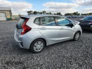 ✅ 2015 Honda Fit LX • VIN: 3HGGK5H51FM774934 • Лот: 90825115. Опубликован ранее на Copart с пробегом 161 315 миль. Бесплатный доступ к архиву аукционных продаж из США и подробный отчёт об истории автомобиля на DreamBid. Изображение 3.