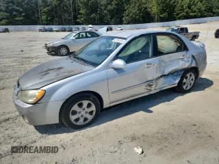 ✅ 2005 Kia Spectra LX • VIN: KNAFE121255097281 • Lot: 80794205. Wystawiony na Copart z przebiegiem 155 400 mil. Bezpłatny archiwum sprzedaży aukcyjnych z USA i szczegółowy raport historii pojazdu na DreamBid. Zdjęcie 1.