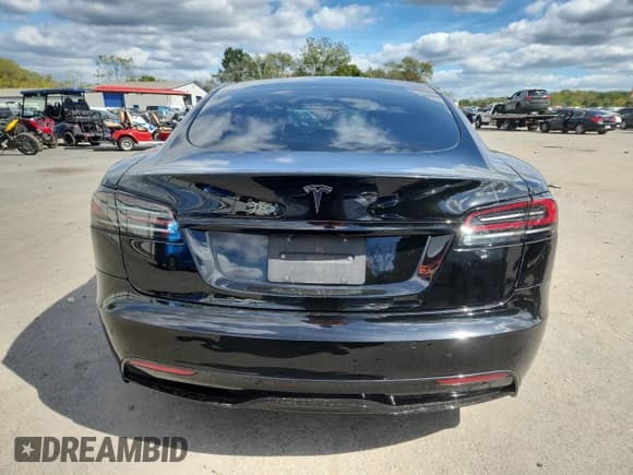 ✅ 2023 Tesla Model S • VIN: 5YJSA1E50PF499975 • Лот: 85133395. Опубликован ранее на Copart с пробегом 51 581 миль. Бесплатный доступ к архиву аукционных продаж из США и подробный отчёт об истории автомобиля на DreamBid. Изображение 6.