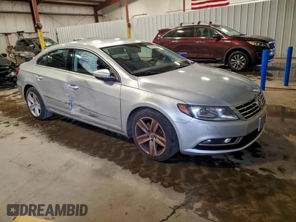 ✅ 2013 Volkswagen CC R-Line • VIN: WVWBP7AN8DE505462 • Lot: 93678945. Listed on Copart with 78,437 mi. Free auction sales archive from the USA and detailed vehicle history report at DreamBid. Image 4.