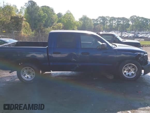 ✅ 2007 Dodge Dakota ST • VIN: 1D3HW28P77S173518 • Лот: 42055934. Опубликован ранее на IAAI с пробегом 165 794 миль. Бесплатный доступ к архиву аукционных продаж из США и подробный отчёт об истории автомобиля на DreamBid. Изображение 13.