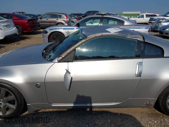 ✅ 2003 Nissan 350Z Touring • VIN: JN1AZ34D43T103694 • Lot: 42602625. Wystawiony na IAAI z przebiegiem 271 699 mil. Bezpłatny archiwum sprzedaży aukcyjnych z USA i szczegółowy raport historii pojazdu na DreamBid. Zdjęcie 15.