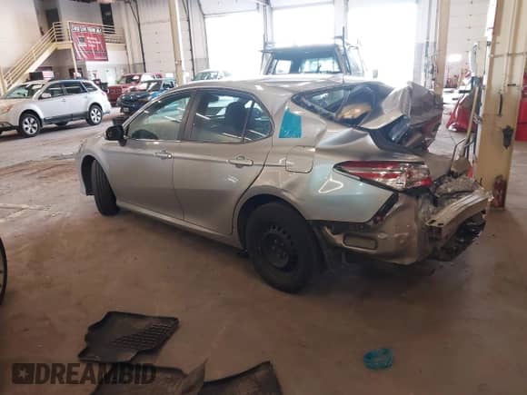 2020 Toyota Camry Hybrid LE with VIN 4T1C31AK3LU518011, listed as a IAAI auction lot 42000046 with 177,245 mi miles and . Bid and sale history available at DreamBid. Image 3.